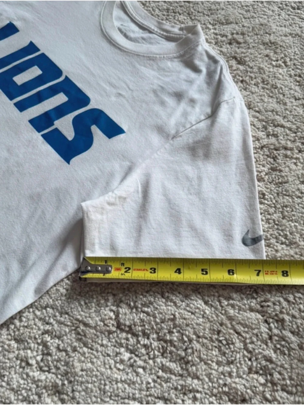 Nike White Short-Sleeve 'LIONS' Graphic Tee with Blue Logo